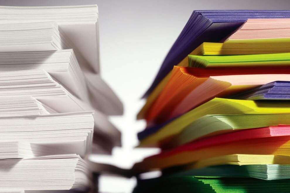 Pile of white and colored papers